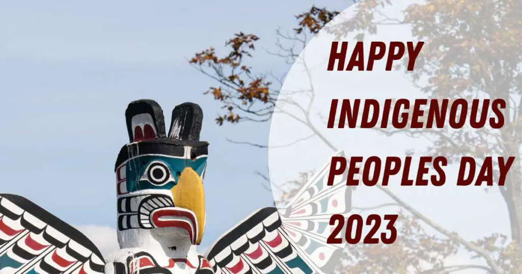 Totem in the background of image that says Happy Indigenous Peoples Day 2023