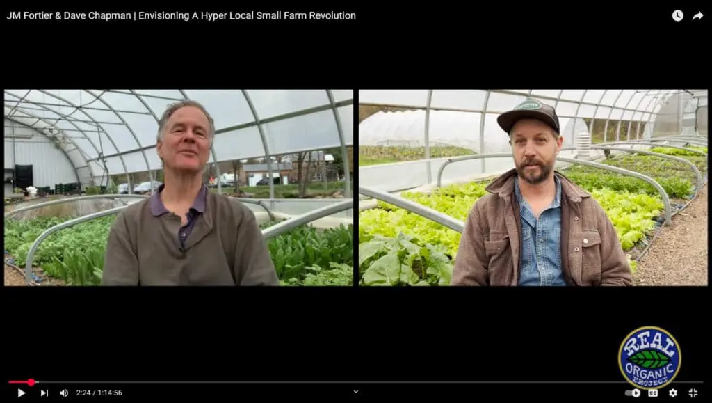 Two men sit in a greenhouse, podcasting the hyper-local small farm revolution.