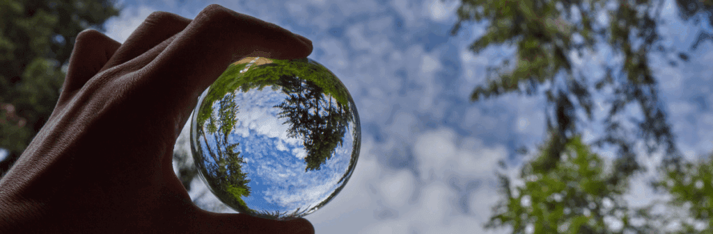 An alternate view of the world from a glass sphere representing the inner landscape.