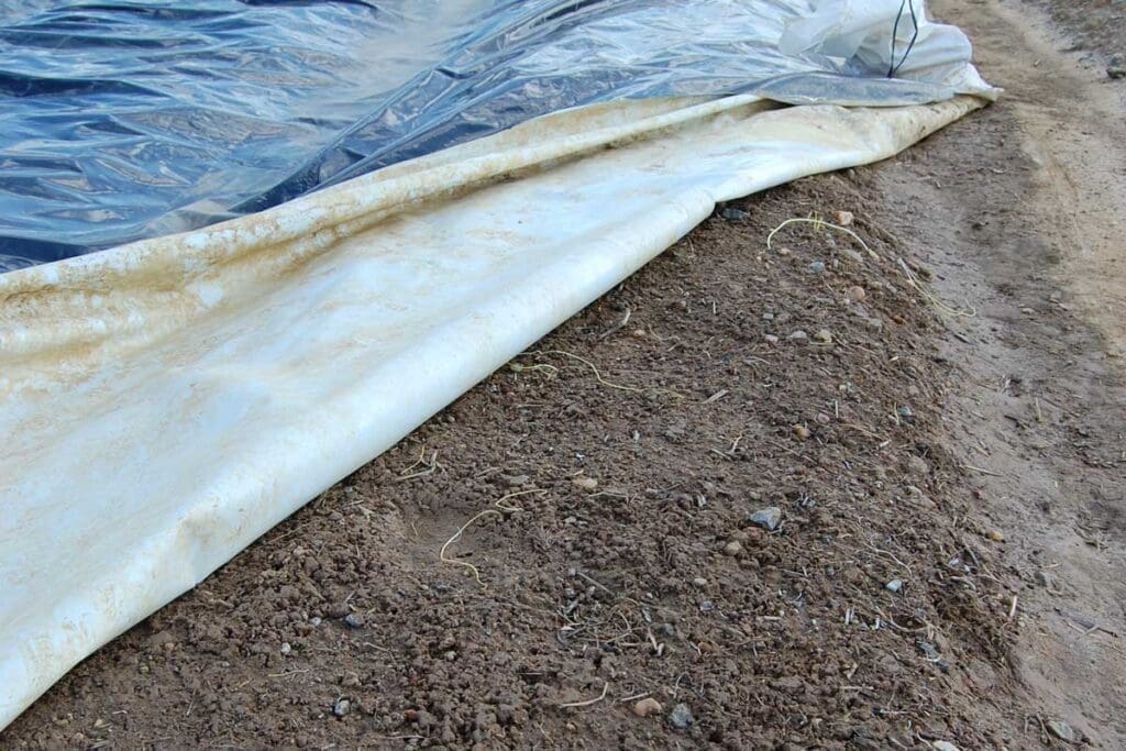 Soil under a tarp.