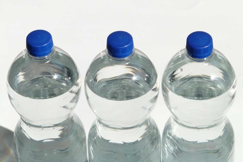 Three full water bottles.