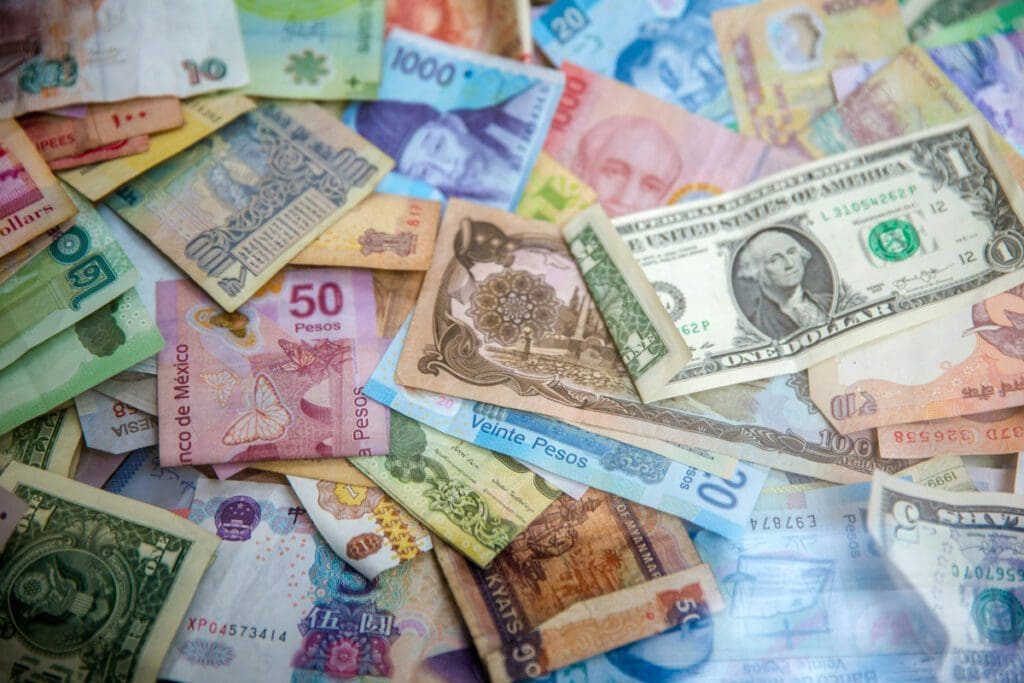 A pile csh in varying currencies.