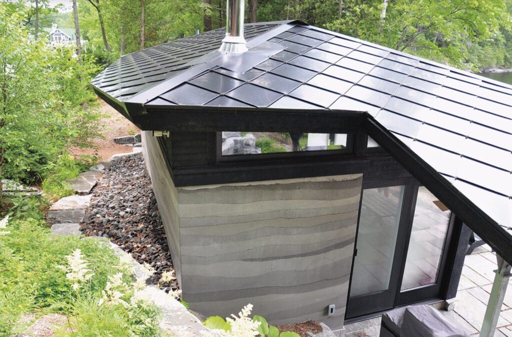 The "Exterior" product features a small modern building with a distinctive angular black roof, expansive windows, and a natural stone pathway, all nestled within a wooded area.
