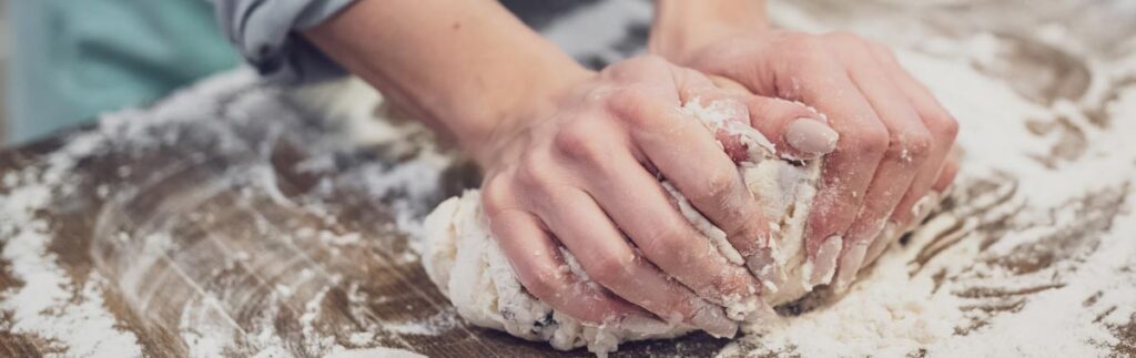 Mixing the dough by hand.