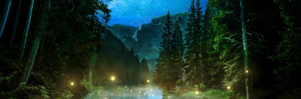 Night scene featuring glowing fireflies in a forest with a lake and mountains in the background.