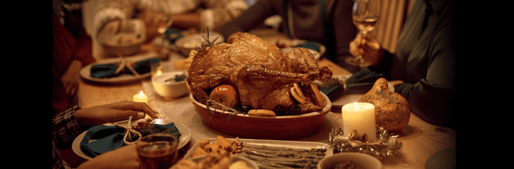 A roast turkey centerpiece graces a festive dinner table adorned with candles and vegetables, embodying the spirit of purposeful hosting.