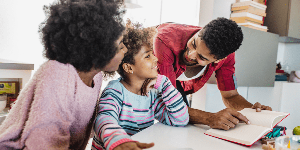 Family enthusiastically helps a child with homework, embracing education's joys together.