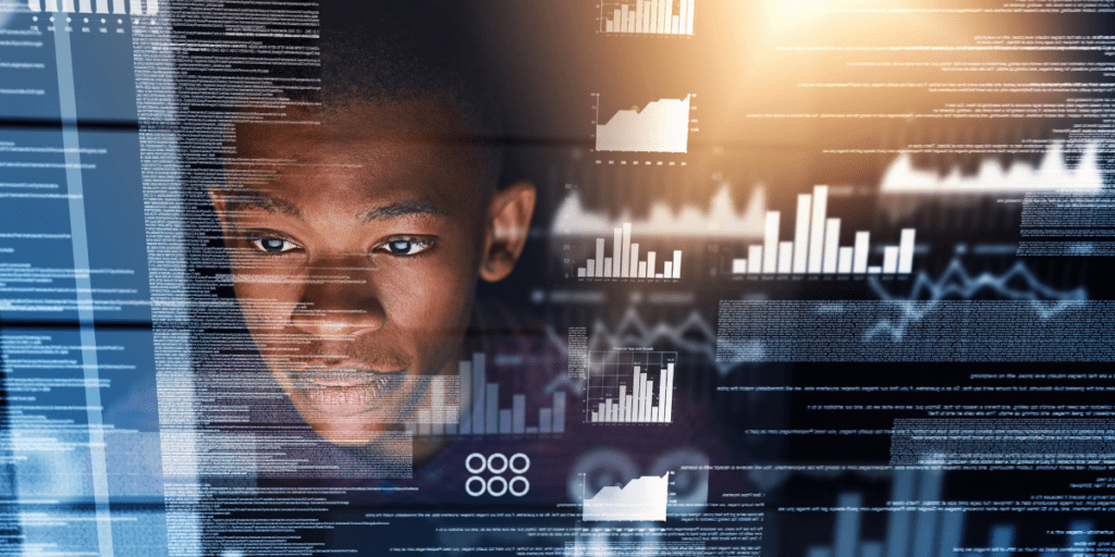 Person analyzing digital data with graphs and code projected on a simplified screen.