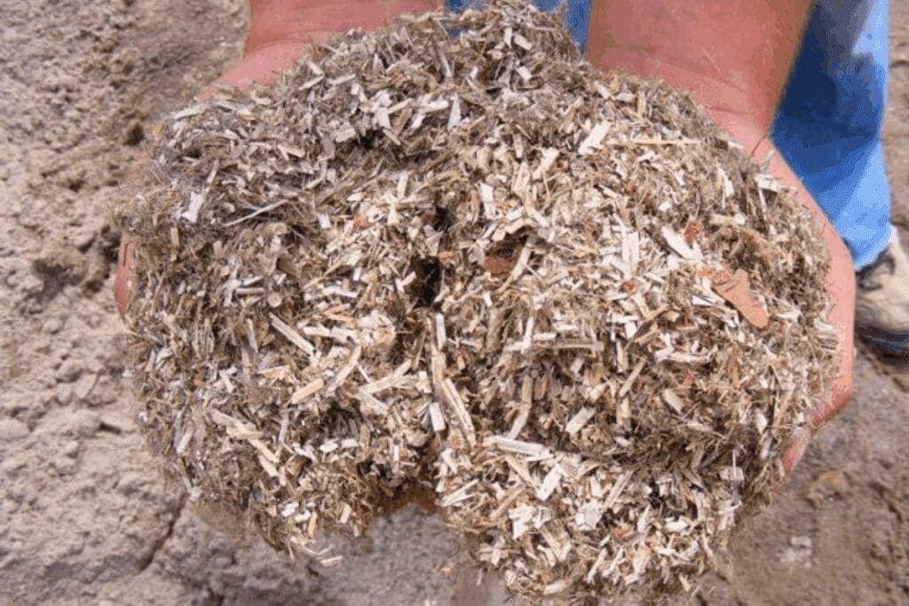 Dried, shredded organic plant material used in Hempcrete construction projects.